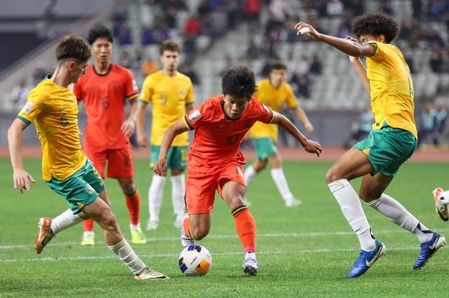 1739946512610018317.jpg (体育)(13)足球——U20亚洲杯:中国队不敌澳大利亚队XxjpseC007151_20250218_PEPFN0A001.jpg